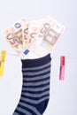 Savings hidden in a sock Royalty Free Stock Photo