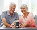 Savings, investment and portrait of old couple with money in jar for retirement, fund or future plan. Senior, finance Royalty Free Stock Photo