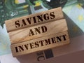 Savings and investment words on Wood Blocks. Retirement future planning concept Royalty Free Stock Photo