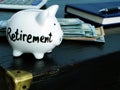 Savings for retirement. Piggy bank on  table Royalty Free Stock Photo