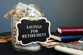 Savings for retirement sign on the jar with money Royalty Free Stock Photo