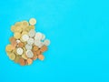 Savings that are stacked in layers With gold coin and silver coin Blue background Royalty Free Stock Photo