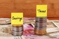 Savings and taxes Royalty Free Stock Photo