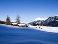 Savognin: snow-covered mountains and ski slopes Royalty Free Stock Photo