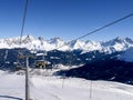 Savognin: snow-covered mountains and ski slopes Royalty Free Stock Photo