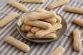 Savoiardi biscuits on a plate, side view Royalty Free Stock Photo
