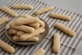 Savoiardi biscuits on a plate, side view Royalty Free Stock Photo
