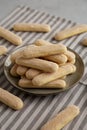 Savoiardi biscuits on a plate, side view Royalty Free Stock Photo
