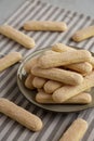 Savoiardi biscuits on a plate, side view Royalty Free Stock Photo