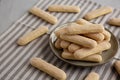Savoiardi biscuits on a plate, side view Royalty Free Stock Photo