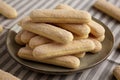 Savoiardi biscuits on a plate, side view Royalty Free Stock Photo