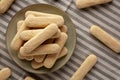 Savoiardi biscuits on a plate, top view Royalty Free Stock Photo