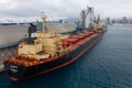 Bulk carrier, dry cargo vessel bulker Eleni P. in Savona seaport, Italy Royalty Free Stock Photo