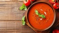 Savor the Flavor: Tempting Tomato Cream Soup on a Rustic Wooden Table
