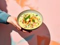 Savor the Warmth: An Artistic Close-up of a Bowl of Hearty Potato Soup