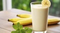 Savoring the Taste of a Fresh Banana Smoothie on a Rustic Wooden Table. Generative AI Royalty Free Stock Photo