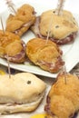 Savory aperitif sandwiches stuffed with cold cuts