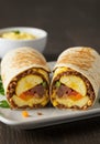 Savory Breakfast Burrito with Scrambled Eggs and Meat Royalty Free Stock Photo