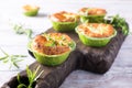 Savory cheddar cheese and leek mini quiches Royalty Free Stock Photo