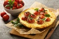 Savory cheese tart with cherry tomatoes Royalty Free Stock Photo