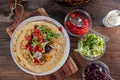 Savory crepes with meat and vegetables on a wooden table Royalty Free Stock Photo