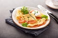 Savory crepes with salmon filling