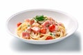 Savory Delight: Pasta with Ham and Fresh Parsley on a White Plate