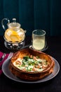 savory dutch baby pancake with egg, bacon, traditional Dutch breakfast