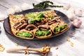 Savory Homemade Mushroom and Spinach Crepes with Cheese and avocado. Royalty Free Stock Photo