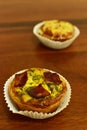 Savory mini quiches tarts on a wooden board. Baked homemade flaky dough pies. Ready for eat. Copy space Royalty Free Stock Photo