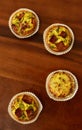 Savory mini quiches tarts on a wooden board. Baked homemade flaky dough pies. Ready for eat. Copy space Royalty Free Stock Photo