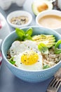 Savory oatmeal with egg and avocado