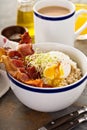 Savory oatmeal porridge with egg and bacon Royalty Free Stock Photo