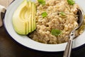 Savory oatmeal porridge with olive oil and avocado