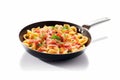 Savory Pasta Medley: Skillet Tossing with Diced Ham Creates a Flavorful Fusion on White Background