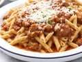 Savory penne embraced by a hearty meat sauce Royalty Free Stock Photo