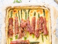 Savory pie with asparagus, prosciutto and marjoram