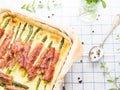 Savory pie with asparagus, prosciutto and marjoram