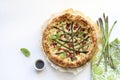 Savory pie with asparagus, ricotta and speck.
