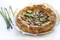 Savory pie with asparagus, ricotta and speck.