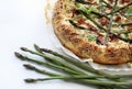 Savory pie with asparagus, ricotta and speck.