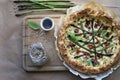 Savory pie with asparagus, ricotta and speck.