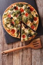 Savory Pie: Sliced Quiche with chicken, broccoli, tomatoes and o Royalty Free Stock Photo