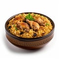 Savory Saudi Arabian Kabsa Chicken and Rice Bowl on White Background .