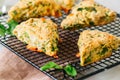 Savory scones with feta mozarella and green herbs Royalty Free Stock Photo