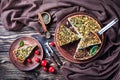 Savory sliced quiche with greens, heavy cream