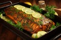 Savory and succulent roasted fish with aromatic herbs cooked to perfection in a sizzling pan