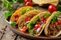 Savory Tacos on Rustic Wooden Board Royalty Free Stock Photo