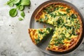 Savory tart of rich egg custard, spinach and cheese with cut out a slice on the plate Royalty Free Stock Photo