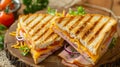 Savory triangle sandwich with ham, cheese, and tomato salad, a delightful and satisfying meal option